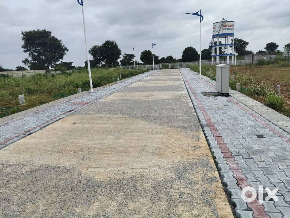 PLOTS ATTACHED TO MYSORE -MADIKERI HIGHWAY -275 ( NEAR YELWALA )