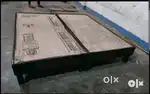 Wooden double bed without storage