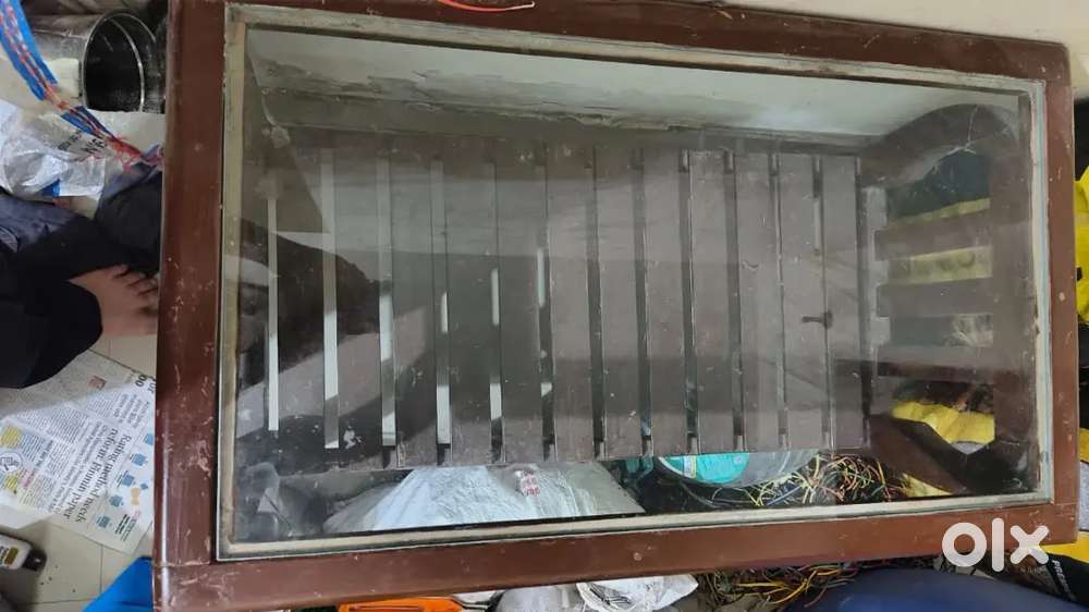 Brown wooden glass tea table