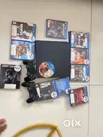 PS4 Slim 1 TB 2 controller and Game CD’s