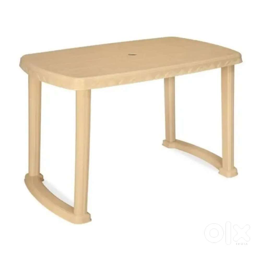 Plastic dining table with two chairs