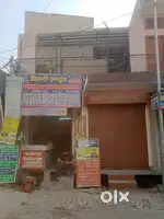 House upstairs and two shops downstairs on sale