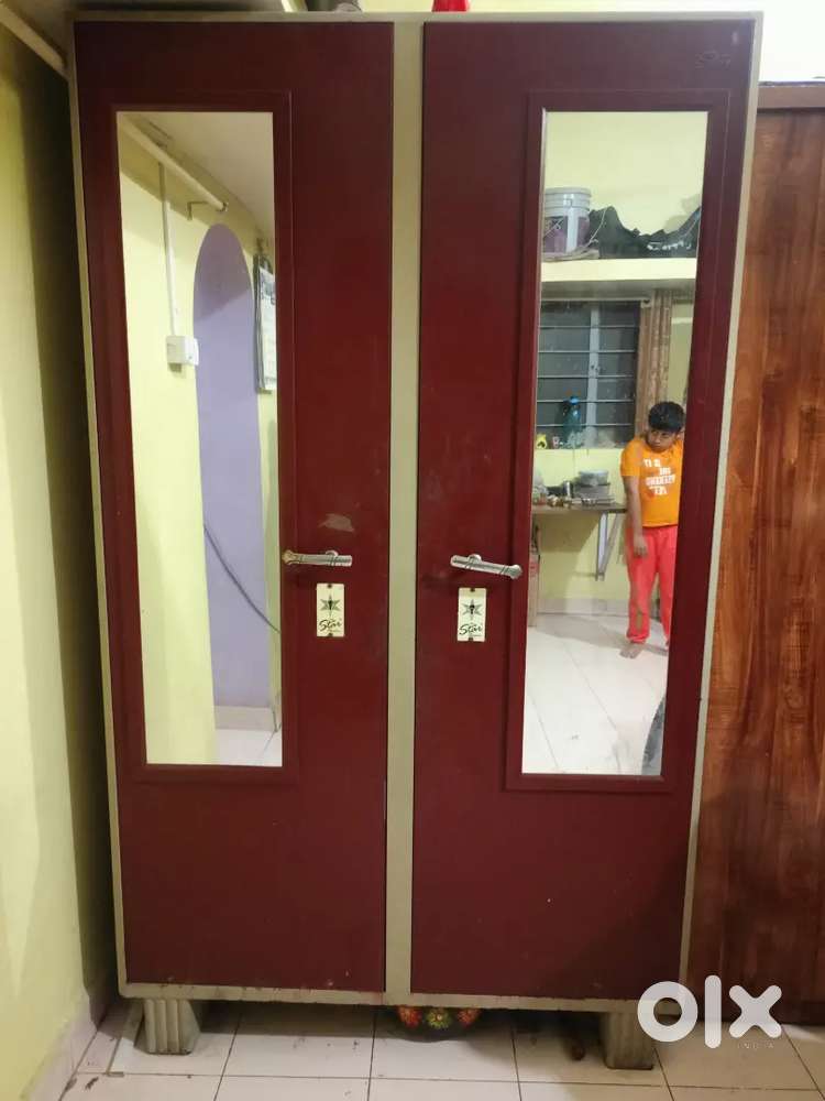 Cupboard with two sided door