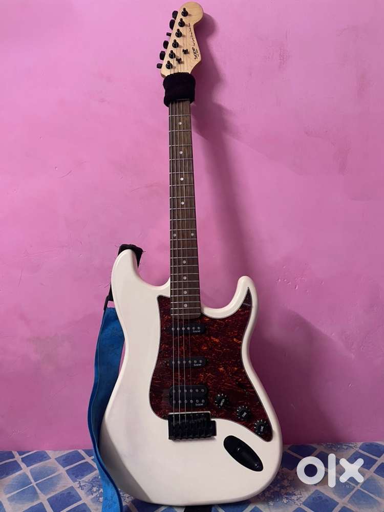 Sqoe electric guitar and processor or wireless system