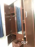 3 door wardrobe with dressing unit and mirror attached
