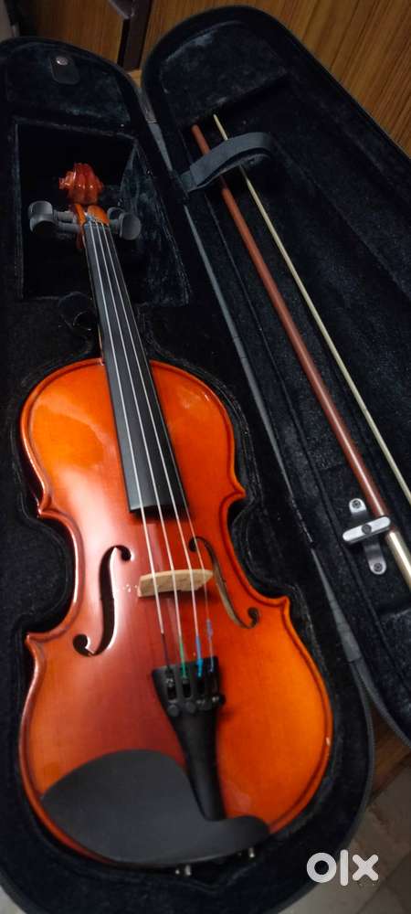 A brown Violin of size 1/4