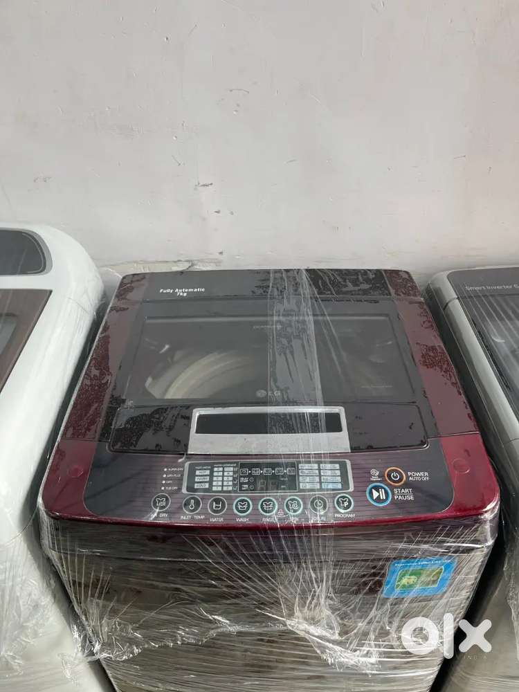 LG washing machine fully automatic top load with warranty 1 year old