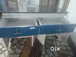Kitchen storage and kitchen counter with table top grenite