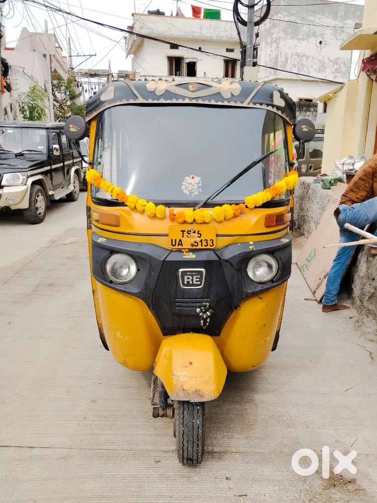 bajaj auto rickshaw with the sangaraddy passing