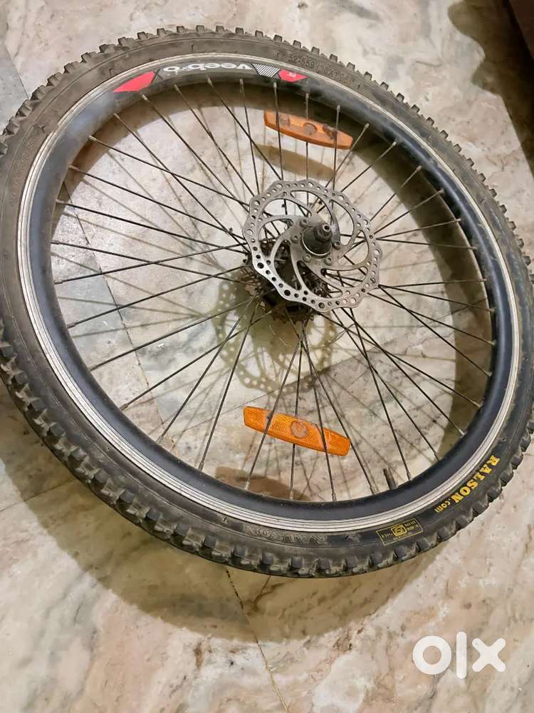 Tyre and rim with disc break and gear channel.