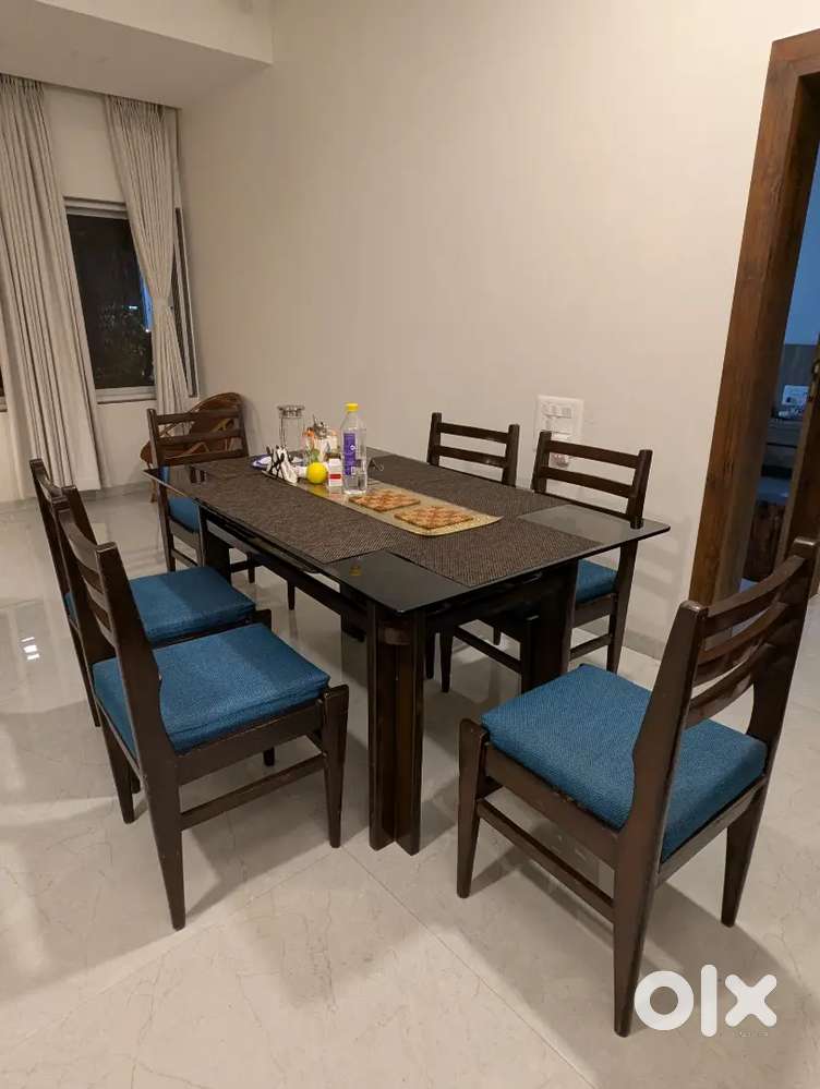 Glass top dining table