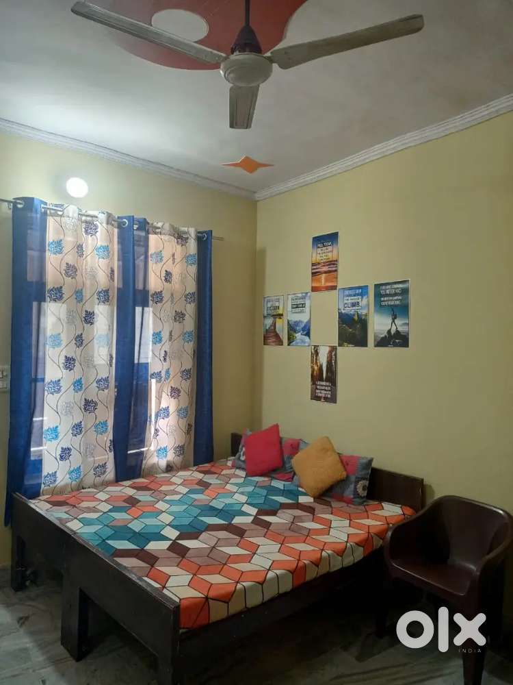 Furnished room with kitchen , Bed with mattress, almirah