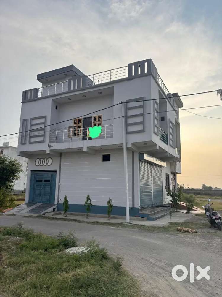 60 gaj do raste ka makan 40 fit road or do dukan double story bana hua