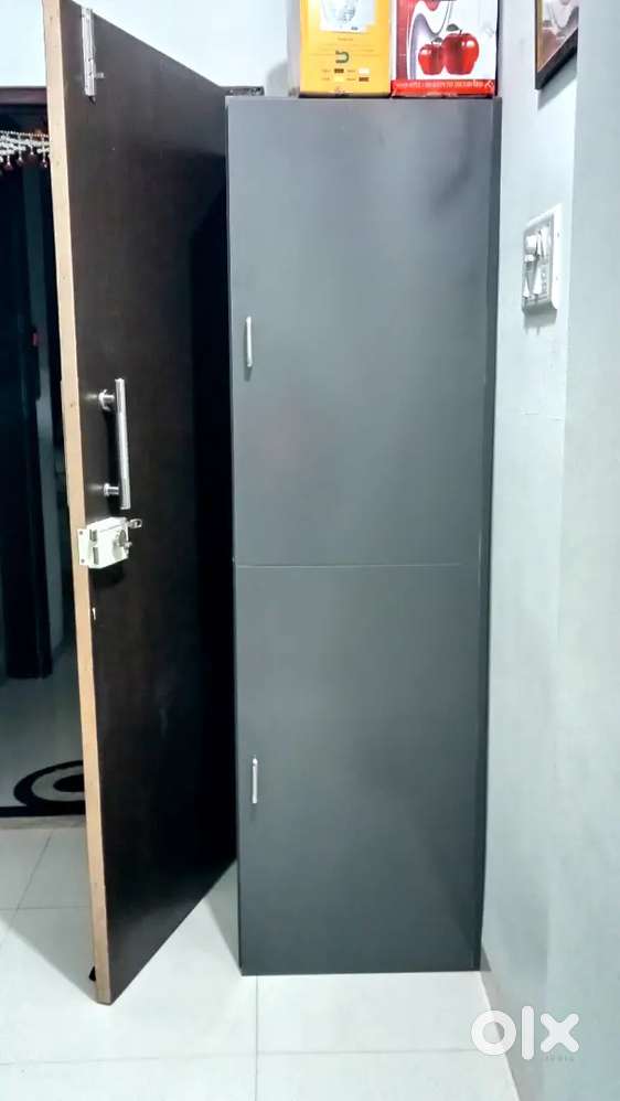 2-Door Grey Wooden Cupboard in Great Condition – Budget Friendly