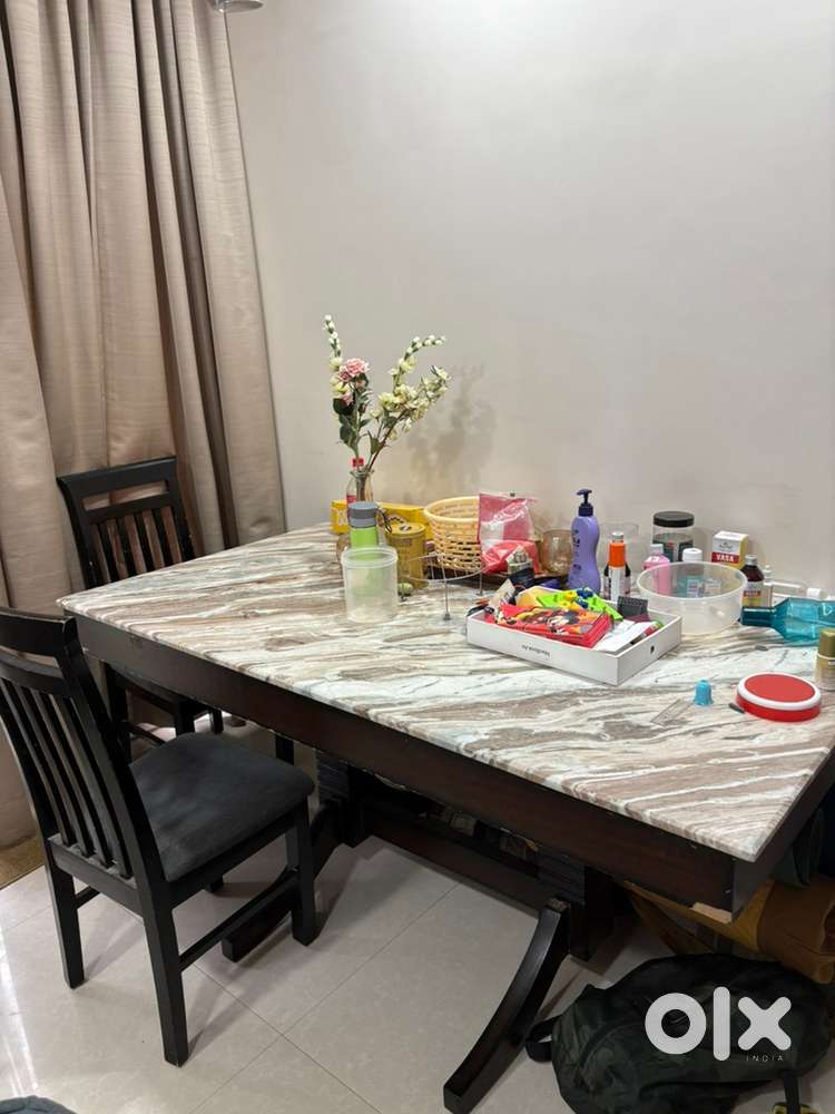 5.5 x 3 ft Granite table top dining table with wooden base and chairs