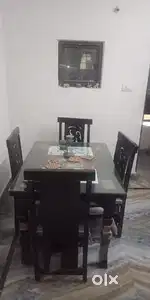 dining table with 4 seater and marble glass