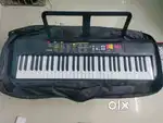Yamaha PSR F-52 keyboard 61 keys with bag.