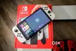 Nintendo Switch OLED Bundle 64GB with extras