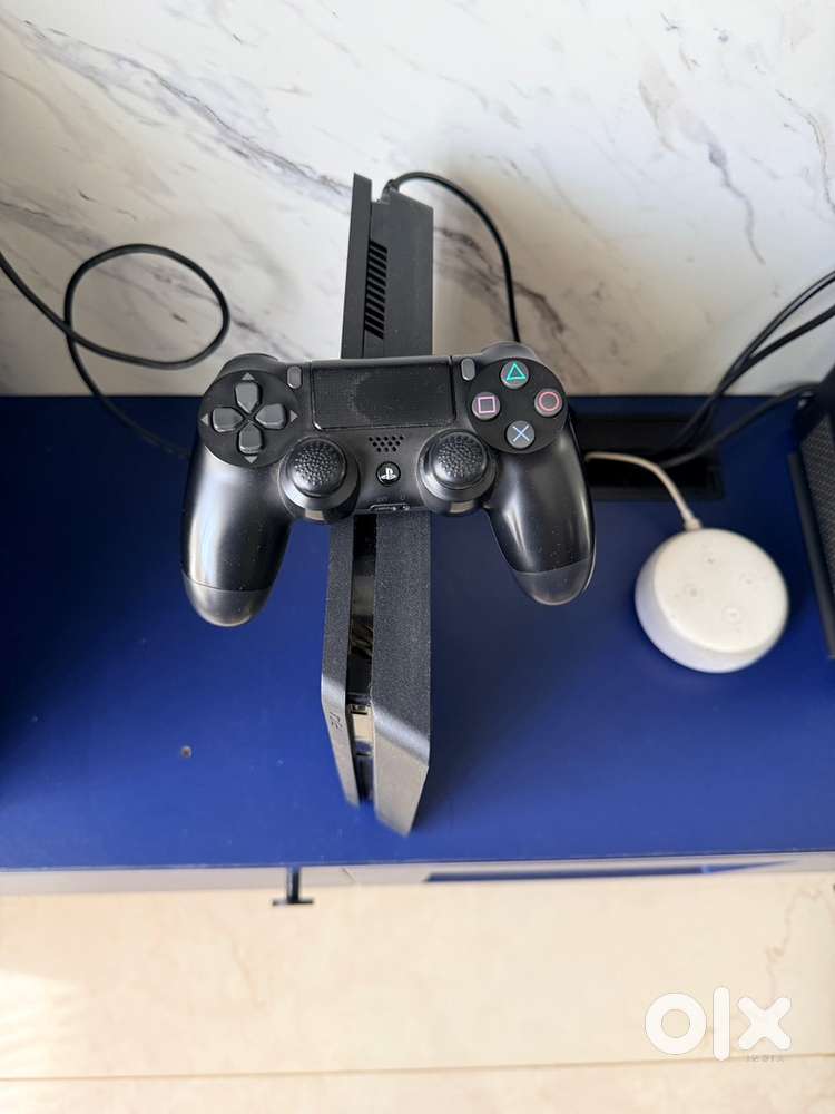 PS4 SLIM 1 TB GAMING CONSOLE