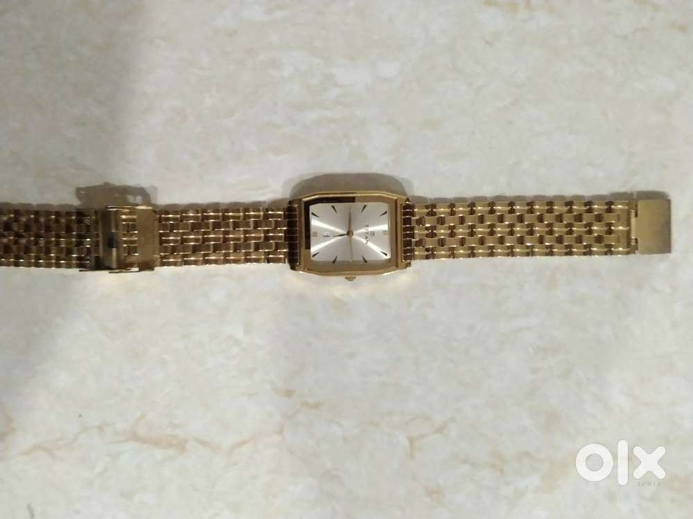 Titan Karishma Model : 1461YAA Gold Watch