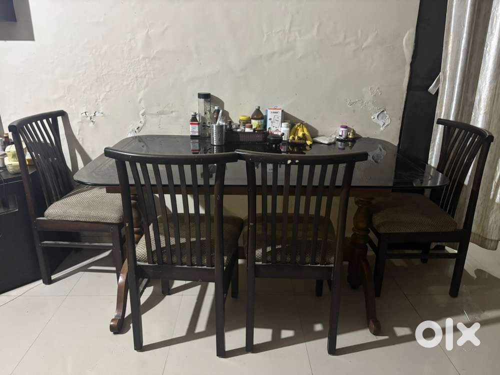 Teakwood 4 seater Dining Table with glass top