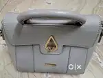 Code leather grey purse bought from MBDfor Rs 2700.