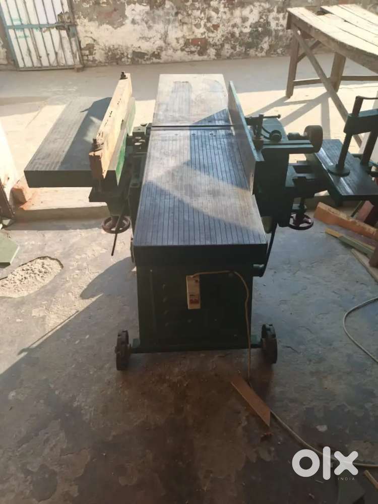 Wooden saw and planer machine