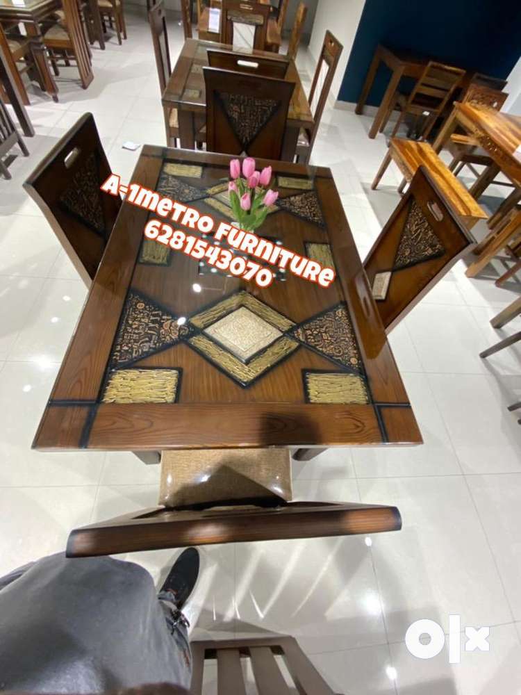 4 seater dining table with glass