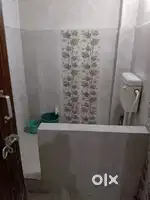 Big room attached latrin bathroom with bed fan