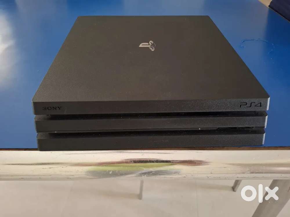 PS4 PRO 1TB 12.02 + GAMMA Latest Model + Games  almost new condition
