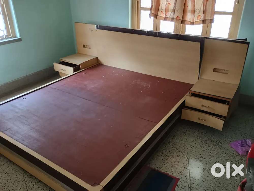 Bed with side drawers