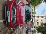 Red colour. Well mentioned car,