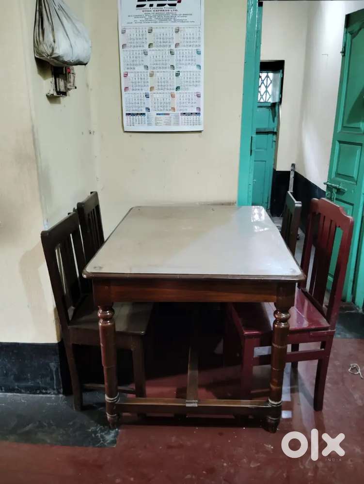 Dining wooden table and 4 chairs