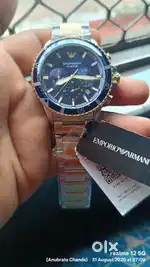 Emporio Armani. 100% original watch 2 days running