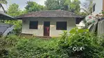 Plot with house for sale