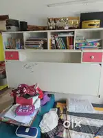 Book shelf unit with built in study table