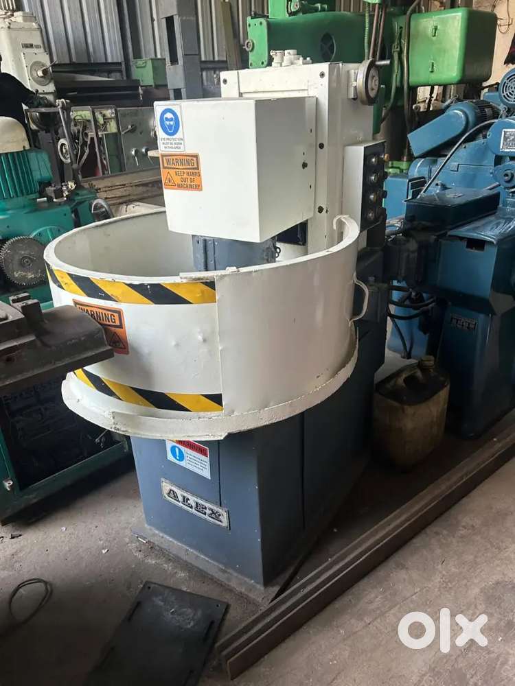 Alex vertical spindle rotary surface grinding machine. 