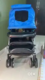 Kids Pram (up to 20 KG ) + Baby Carrier in very good condition