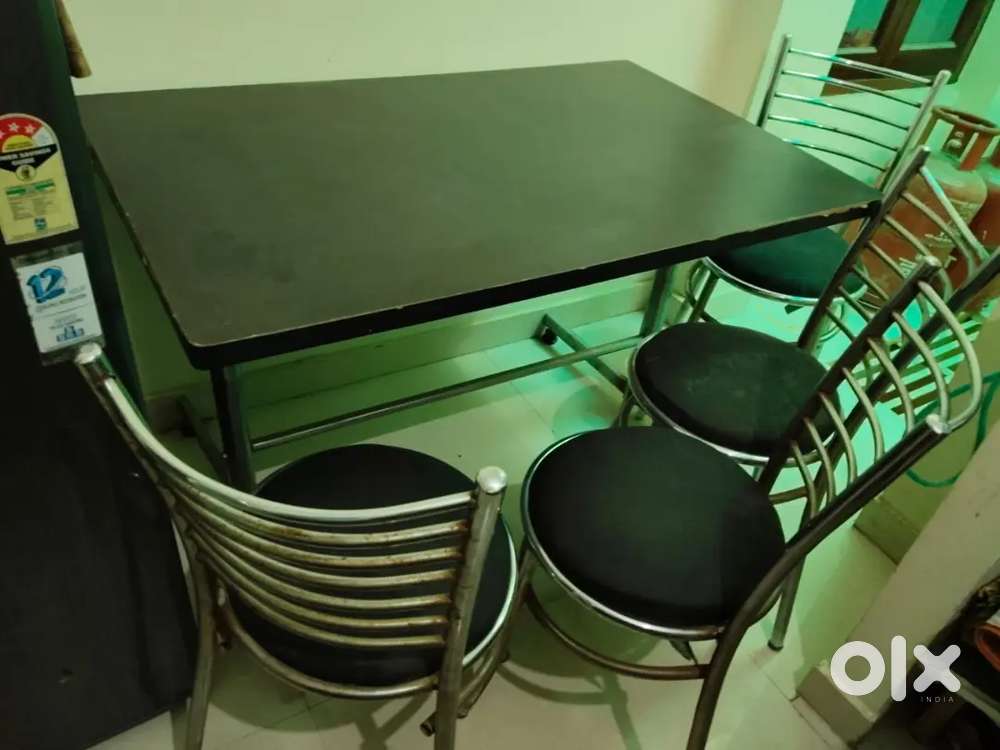 Steel 4 seater dining table with chair