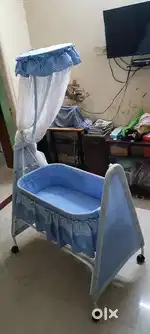 Baby cradle with mosquito net