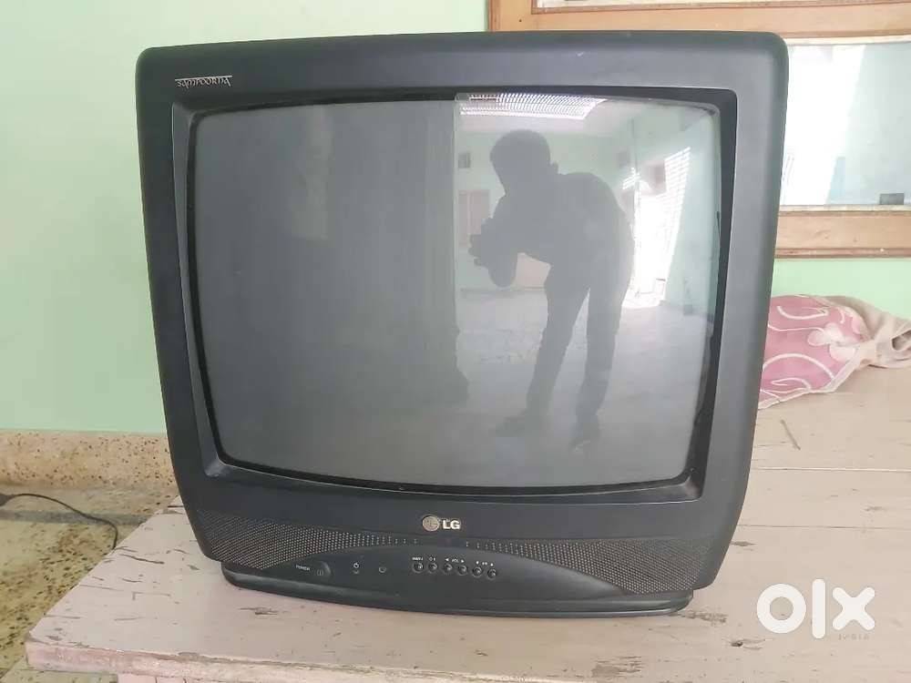 L.G. colour T.V., with T.V. glass stand, T.V cover, T.V. remote