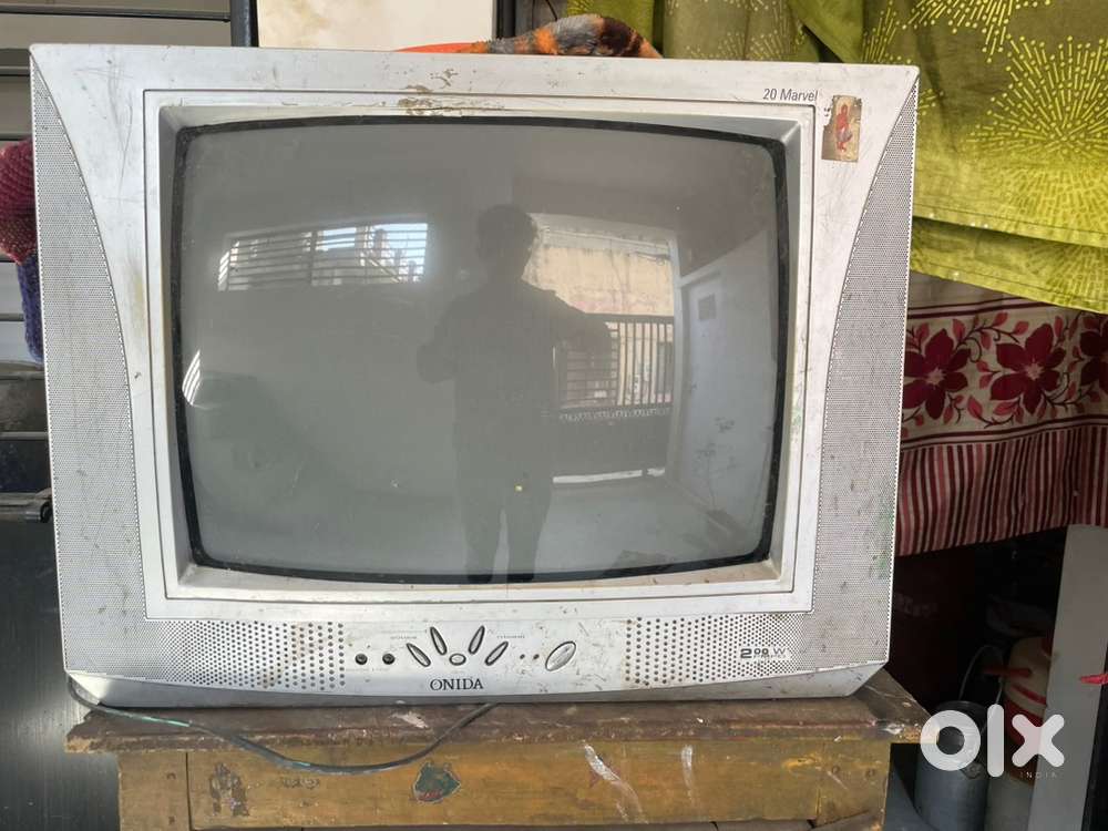 Old onida tv with dish and setup box