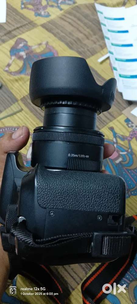 CANNON 1300D WITH CANNON 50MM STM LENS..BETTARY CHARGER LENS HOOD ..L