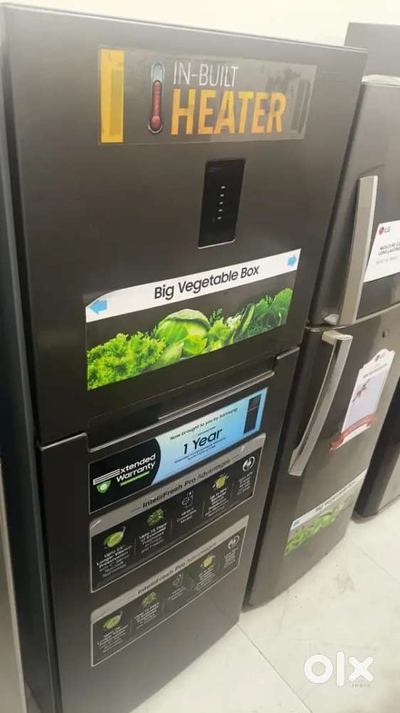 Samsung double door fridge good condition with warranty 1 year old