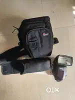 Lowepro camera bag and flash light