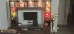 Tv unit having glass doors