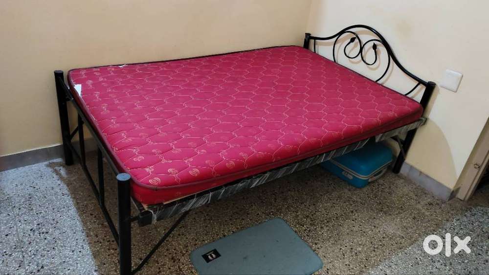 Double size folding bed with mattress