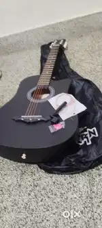 Acoustic guitar with bag
