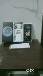 Vivo v30 good condition box and charger available lek green colour