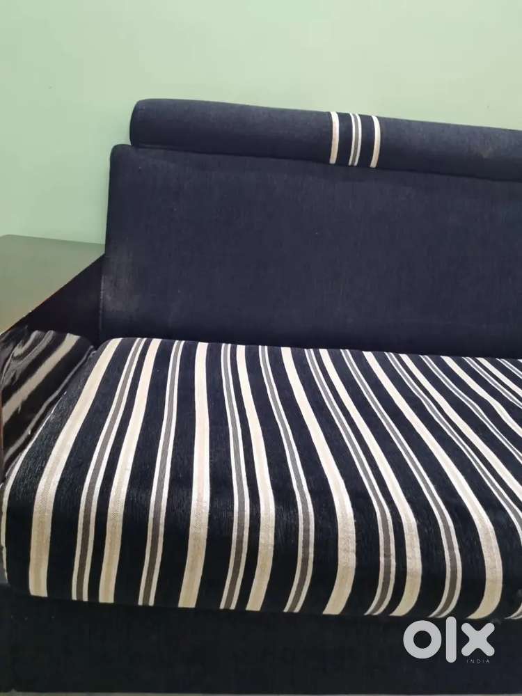 L shaped sofa with attached drawers